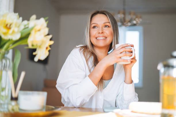 Person enjoying a calm morning routine with natural light
