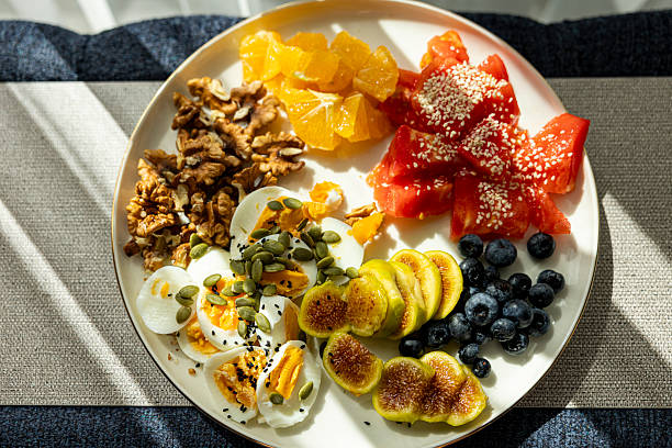 Healthy breakfast spread with fruits and herbal tea